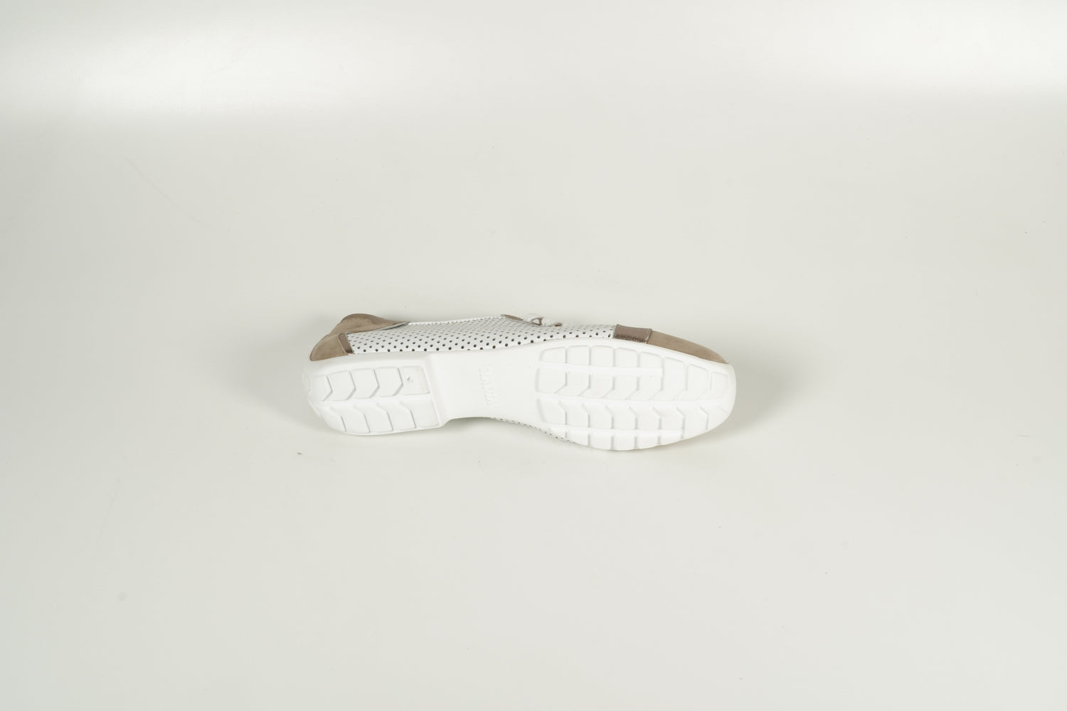 White lace-up shoe